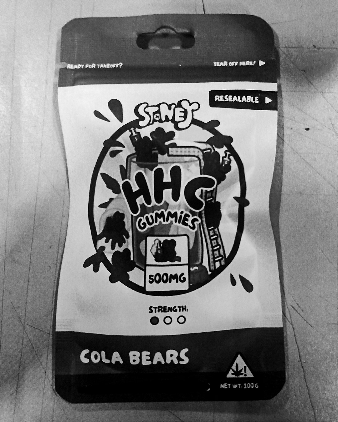 A photocopied customs-file image of a single Stoney HHC cola-bear gummy pouch, marked 500mg and resealable