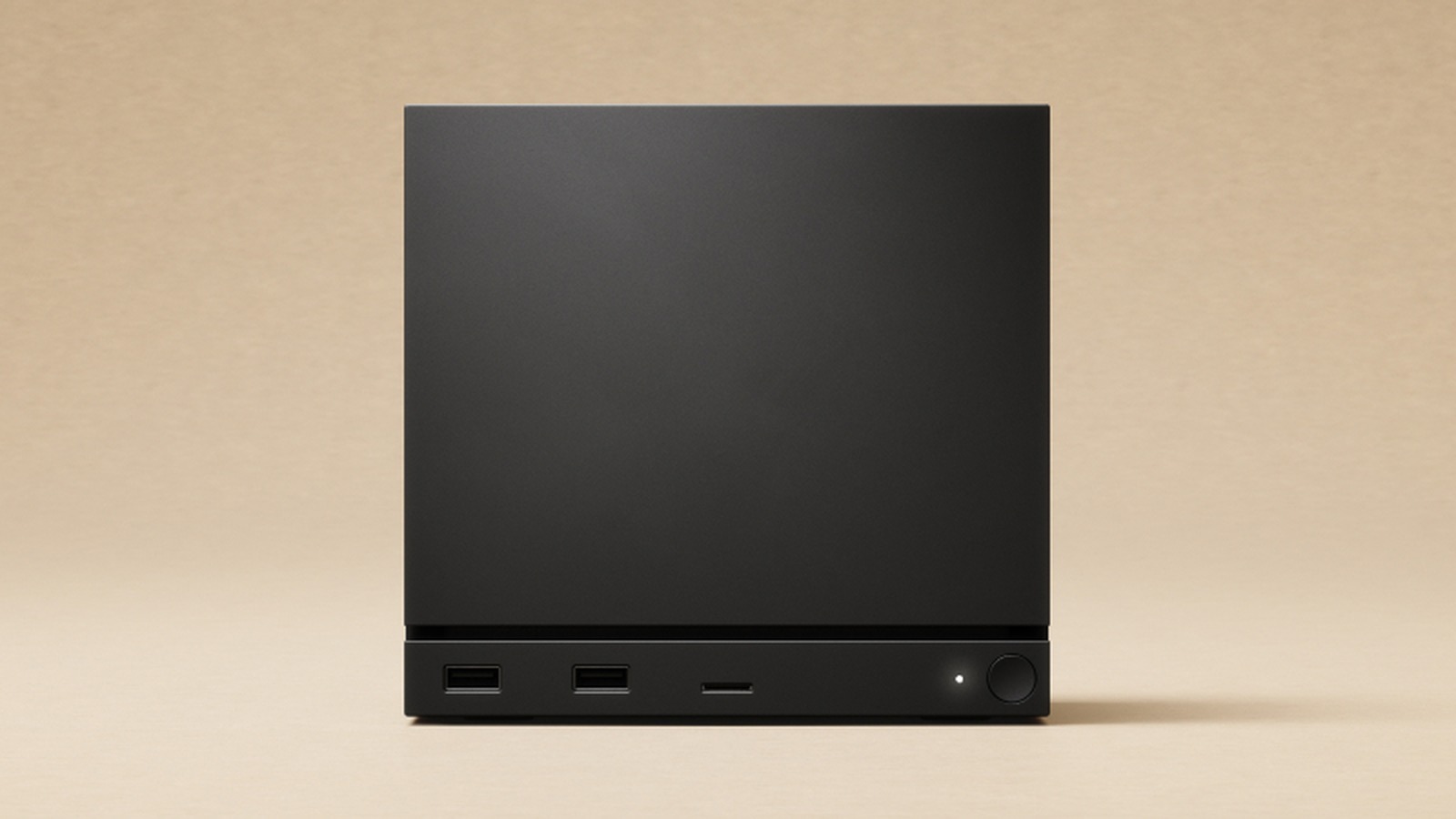 Valve's Steam Machine, a small black cube, on a media stand beneath a television.